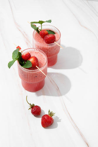 A refreshing Digestive Friendly Strawberry Basil Mocktail, with vibrant strawberries, fresh basil, and a light, fizzy finish, offering a soothing and digestive-supporting beverage.